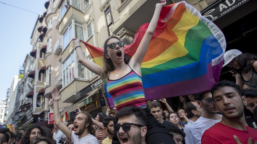 epa06855972 Members of LGBT community shout slogans at Gay Pride parade in Istanbul, Turkey, 01 July 2018. Gay Pride marches are taking place across the world to promote LGBT rights and condemn discri ...