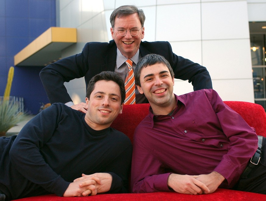 FILE - In this Jan. 15, 2004 file photo, Google CEO Eric Schmidt, top, and co-founders Sergey Brin, left, and Larry Page pose at the company's headquarters in Mountain View, Calif. Google’s IPO 10 yea ...