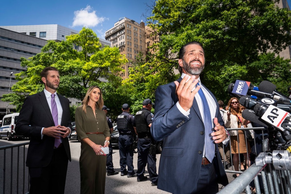 New York, NY - May 28 : Eric Trump, Republican National Committee Co-Chair Lara Trump, and Donald Trump Jr., speak in support of their father to reporters at Collect Pond Park across the street as for ...