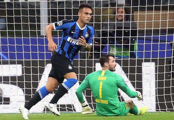 epa07944150 Inter Milans Lautaro Martinez (L) celebrates scoring during the UEFA Champions League group F soccer match between FC Inter and Borussia Dortmund at the Giuseppe Meazza stadium in Milan, I ...