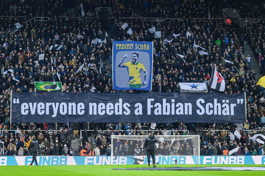 Newcastle United v Manchester City Premier League 13/01/2024. Fans unfurl a banner to Fabian Schar during the Premier League match between Newcastle United and Manchester City at St. James Park, Newca ...