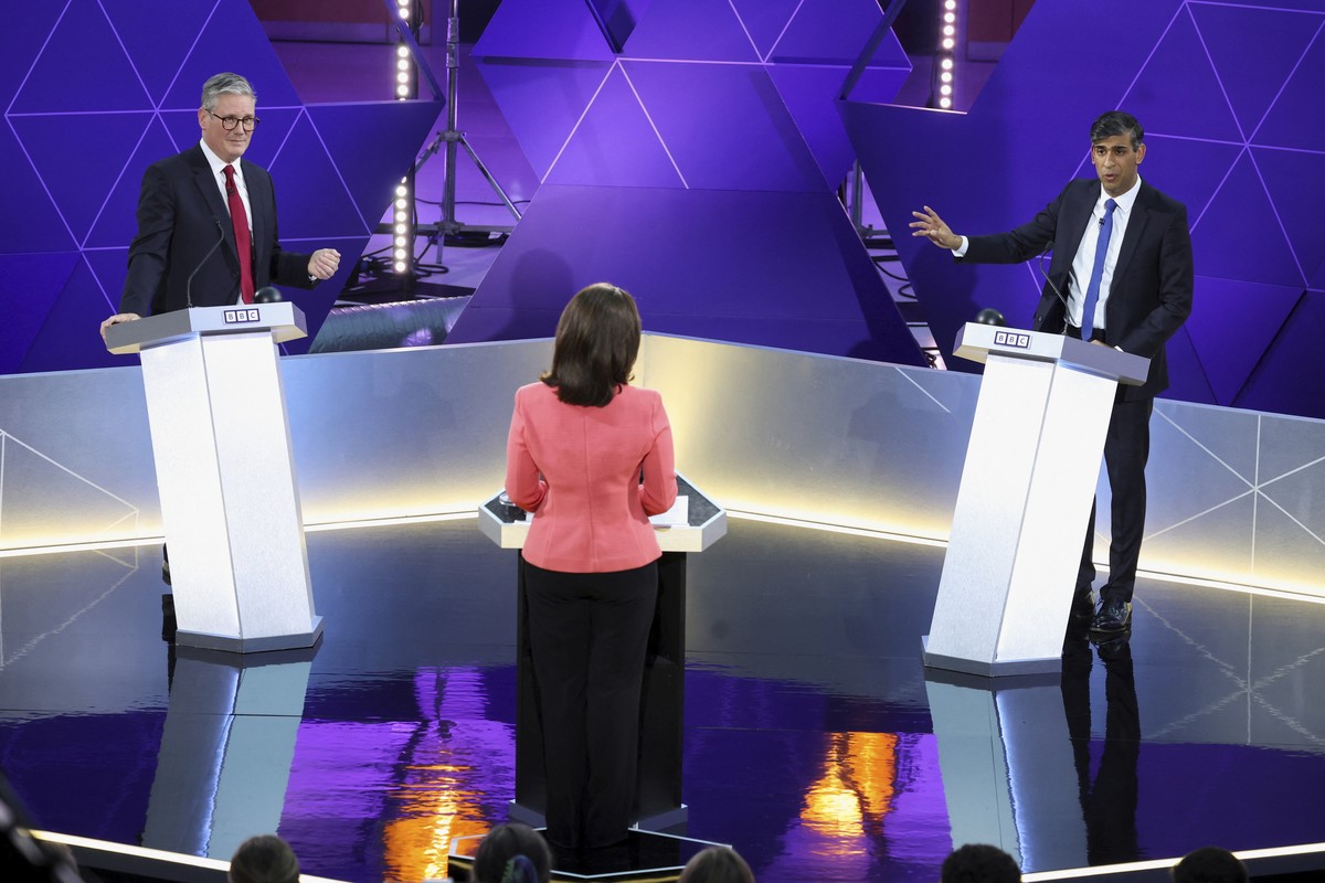 FILE - Britain's Prime Minister Rishi Sunak and opposition Labour Party leader Keir Starmer, left, take part in the BBC's Prime Ministerial Debate, in Nottingham, England, Wednesday June 26, ...