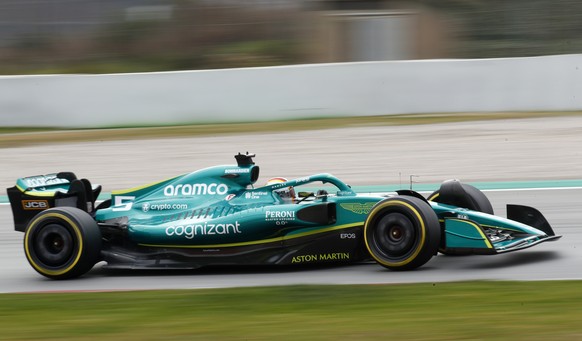 Aston Martin driver Sebastian Vettel of Germany steers his car during a Formula One pre-season testing session at the Catalunya racetrack in Montmelo, just outside of Barcelona, Spain, Friday, Feb. 25 ...