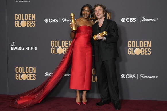Ayo Edebiri, left, winner of for best performance by an actress in a television series, musical or comedy for &quot;The Bear&quot;, and Jeremy Allen White, winner of the award for best performance by  ...