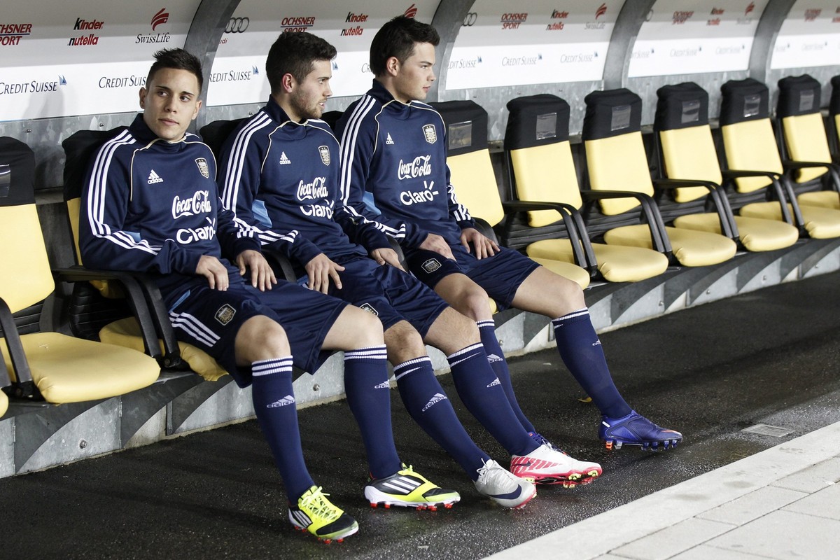 Samir Naili, Leo Bertone, Marco Buerki, three junior players of Young Boys Bern, seen prior to the training session of Argentina's national soccer team in the Stade de Suisse stadium in Bern, Swi ...