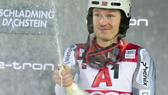 Norway's Henrik Kristoffersen celebrates winning an alpine ski, men's World Cup slalom, in Schladming, Austria, Tuesday, Jan. 28, 2020. (AP Photo/Pier Marco Tacca)