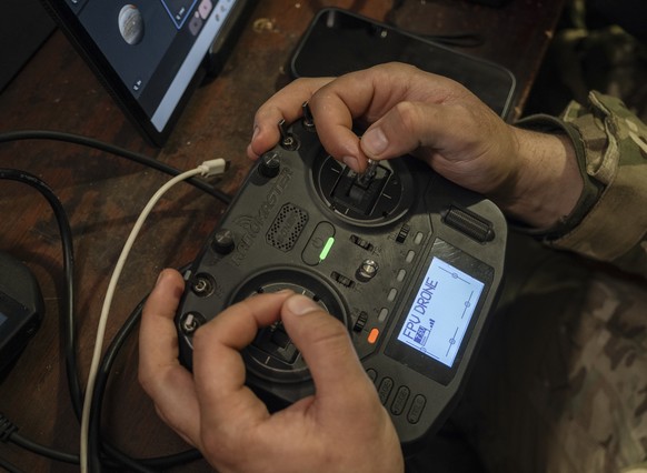 epa12875031 A handout photo made available by the press service of the 93rd 'Kholodnyi Yar' Separate Mechanized Brigade of the Ukrainian Armed Forces on 08 April 2026 shows a serviceman of t ...