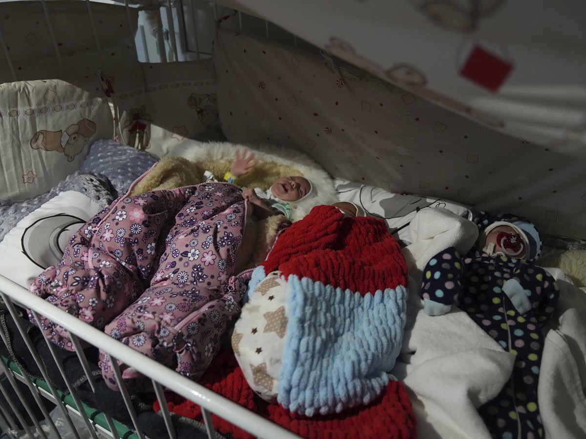Premature babies who were left behind by their parents lay in a bed in hospital number 3 in Mariupol, Ukraine, Tuesday, March 15, 2022. (AP Photo/Evgeniy Maloletka)