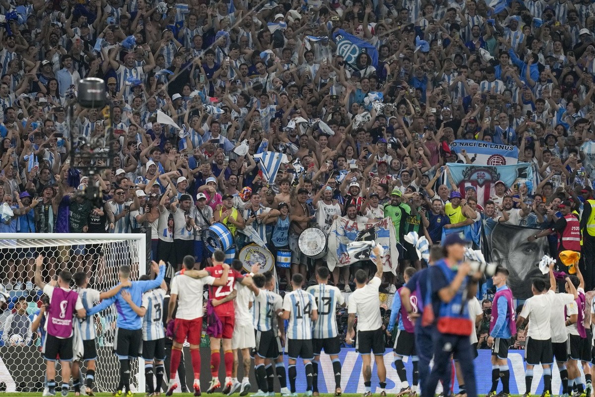 Players of Argentina face fans after beating Australia 2-1 in a World Cup round of 16 soccer match at the Ahmad Bin Ali Stadium in Doha, Qatar, Saturday, Dec. 3, 2022. (AP Photo/Thanassis Stavrakis)