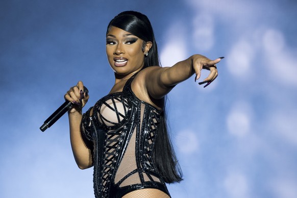 FILE - Megan Thee Stallion performs at Reading Music Festival, England, August 26, 2022. Stallion alongside Red Hot Chili Peppers and Ms. Lauryn Hill will headline this year's Global Citizen Festival…