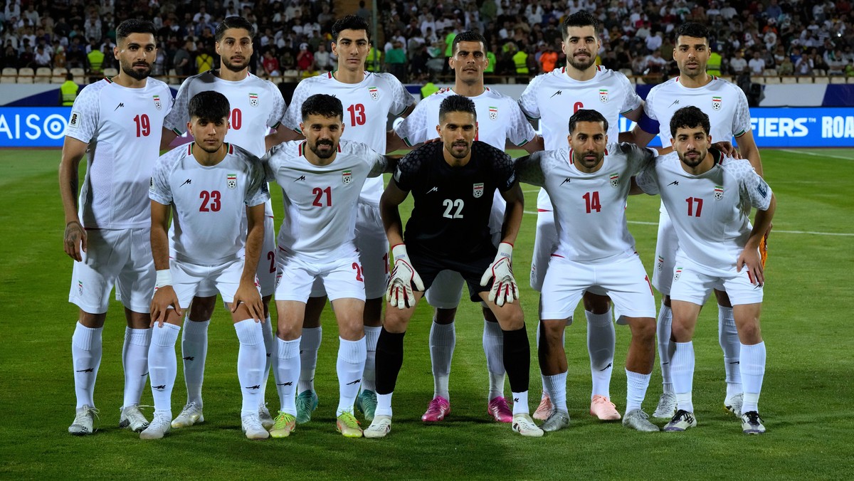 FILE - Irans's players pose for a team photo before an Asian group A qualifying soccer match against North Korea for the 2026 World Cup, June 10, 2025, at Azadi Stadium in Tehran, Iran. (AP Photo ...