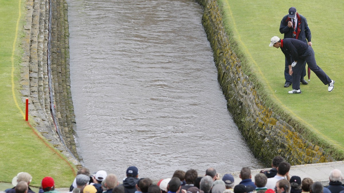 FILE - In this July 22, 2007, file photo, Ireland's Padraig Harrington looks down to where his ball landed in the Barry Burn during the final round of the British Open Golf Championship at Carnou ...