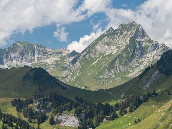 View from Chalet du Soldat on Dent de Brenleire with different chalets, alpine willows, forests and clouds - Gastlosen area in Switzerland xkwx swiss alps, hiking, pasture, switzerland, road, panorami ...