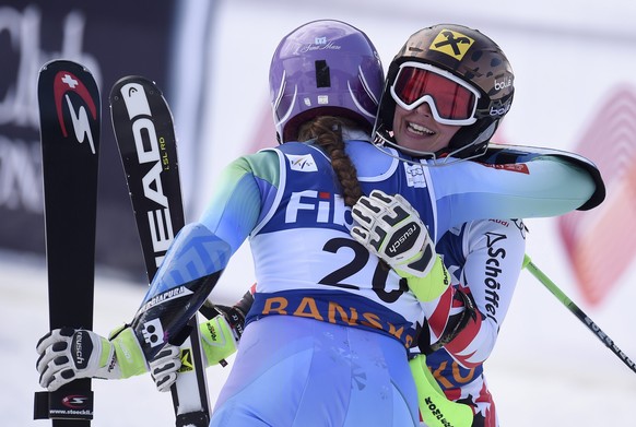 epa04643117 Anna Fenninger (R) of Austria with second placed Slovenian Tina Maze celebrates after winning the Women&#039;s Super Combined competition at the Alpine Skiing World Cup in Bansko, Bulgaria ...