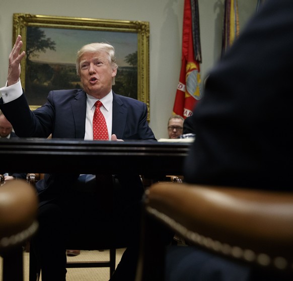 President Donald Trump speaks during a meeting with county sheriffs in the Roosevelt Room of the White House in Washington, Tuesday, Feb. 7, 2017. (AP Photo/Evan Vucci)