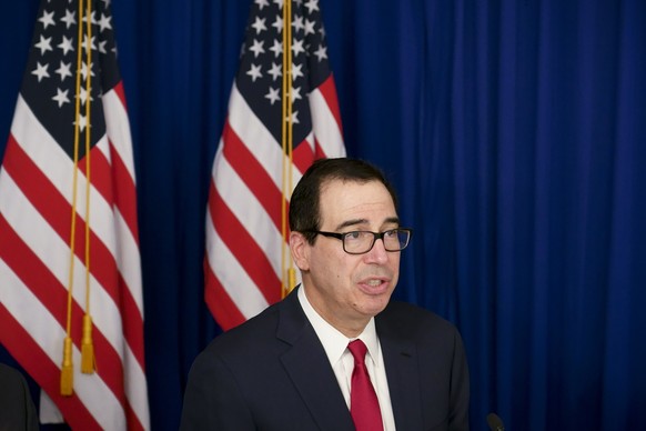 U.S. Treasury Secretary Steven Mnuchin speaks during a press gaggle with reporters in Buenos Aires, Argentina, Saturday, July 21, 2018. Mnuchin said Saturday that Donald Trump was not trying to put pr ...