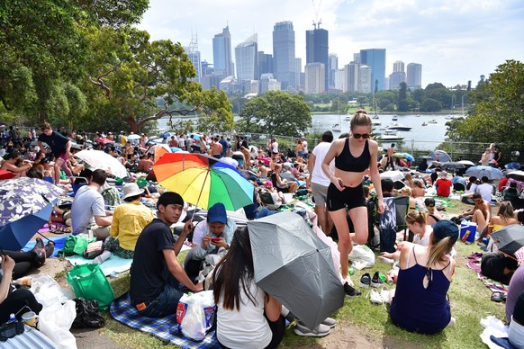 epa07255013 People are seen at Mrs Macquarie&#039;s Point in preparation for New Year&#039;s Eve Fireworks in Sydney, New South Wales, Australia, 31 December 2018. EPA/BRENDAN ESPOSITO AUSTRALIA AND N ...