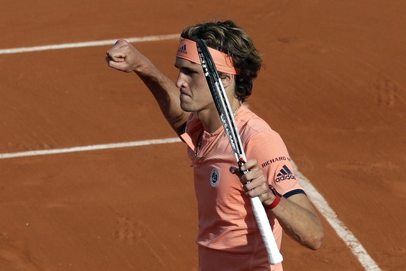 Germany&#039;s Alexander Zverev celebrates as he defeats Serbia&#039;s Dusan Lajovic during their second round match of the French Open tennis tournament at the Roland Garros stadium, Wednesday, May 3 ...