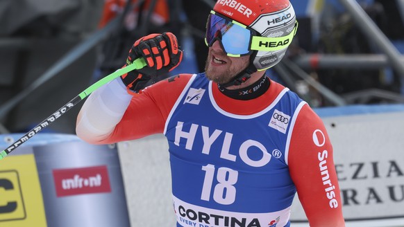 Switzerland&#039;s Justin Murisier arrives at the finish area during an alpine ski, men&#039;s World Cup super-G, in Cortina d&#039;Ampezzo, Italy, Saturday, Jan. 28, 2023. (AP Photo/Alessandro Trovat ...