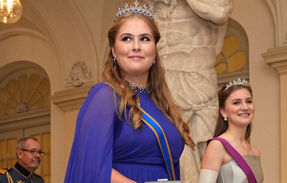 epa10920492 Princess Catherine-Amalia of the Netherlands (L) and Princess Elisabeth of Belgium arrive for a gala dinner to mark the 18th birthday of Prince Christian of Denmark, at Christia ...