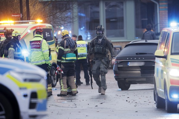 epa11874708 Emergency personnel gather after a shooting at Risbergska School in Orebro, Sweden, 04 February 2025. According to police, five people were shot at the school. EPA/Kicki Nilsson SWEDEN OUT