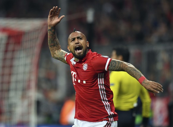 Munich&#039;s Arturo Vidal celebrates the opening goal during the Champions League quarterfinal first leg soccer match between FC Bayern Munich and Real Madrid, in Munich, Germany, Wednesday, April 12 ...