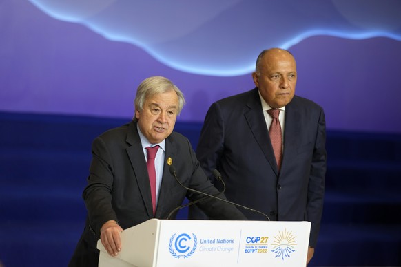 United Nations Secretary-General Antonio Guterres speaks as Sameh Shoukry, president of the COP27 climate summit, stands at right, during the summit, Thursday, Nov. 17, 2022, in Sharm el-Sheikh, Egypt ...