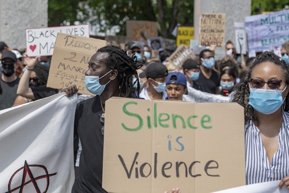 People demonstrate against racism after the worldwide movement of the Black Lives Matter (BLM) protest against the recent death of George Floyd in Luzern, Switzerland, Saturday, 13 June 2020. Floyd, a ...