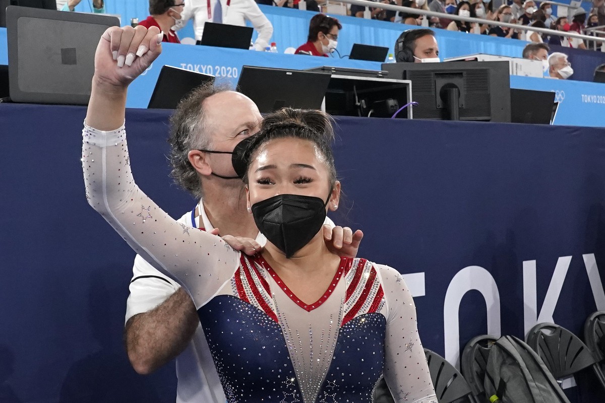 Sunisa Lee, of the United States, celebrates with her coach Jeff Graba after she won the gold medal in the artistic gymnastics women's all-around at the 2020 Summer Olympics, Thursday, July 29, 2 ...