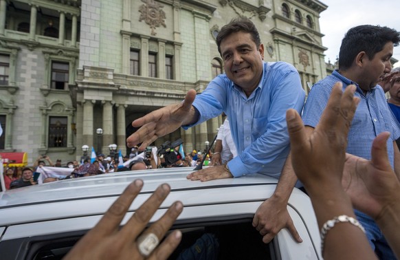 Presidential candidate Carlos Pineda, of the Prosperidad Ciudadana party, greats supporters after leaving the Constitutional Court in Guatemala City, Saturday, May 20, 2023. Pineda seeks to reverse a ...
