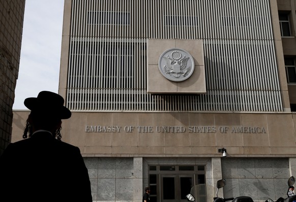 FILE PHOTO: An ultra-Orthodox Jewish man stands in front of the U.S Embassy in Tel Aviv, Israel January 24, 2017. REUTERS/Baz Ratner/File Photo