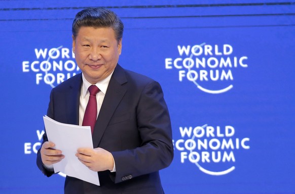 China&#039;s President Xi Jinping smiles to the audience after his speech at the World Economic Forum in Davos, Switzerland, Tuesday, Jan. 17, 2017. (AP Photo/Michel Euler)