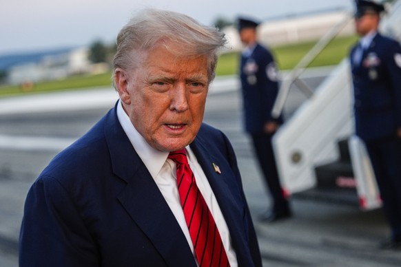 President Donald Trump speaks with reporters before boarding Air Force One at Lehigh Valley International Airport, Sunday, Aug. 3, 2025, in Allentown, Pa. (AP Photo/Julia Demaree Nikhinson)
Trump