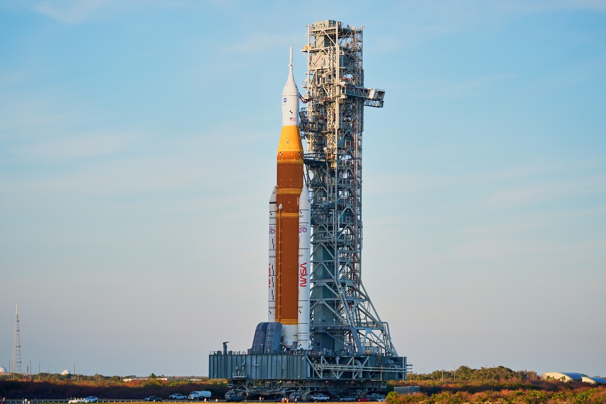 NASA's Artemis II SLS (Space Launch System) moon rocket with the Orion spacecraft slowly rolls back towards the Vehicle Assembly Building at the Kennedy Space Center, Wednesday, Feb. 25, 2026, in ...