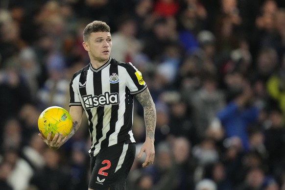 Newcastle&#039;s Kieran Trippier holds the ball prior to taking a penalty in the penalty shoot out during the English League Cup quarterfinal soccer match between Chelsea and Newcastle United at Stamf ...