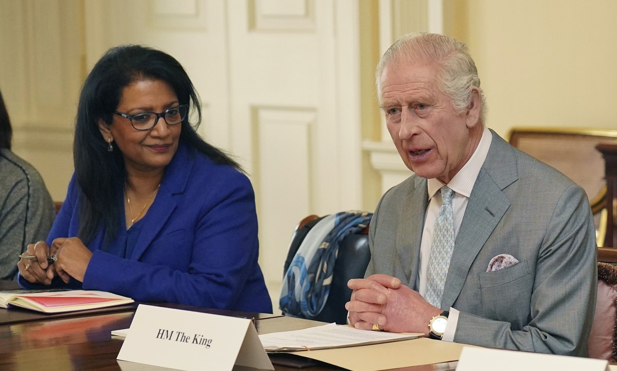 FILE - Britain's King Charles III, right, speaks during an audience in the Billiard Room at Buckingham Palace, London, March 26, 2024 with community faith leaders from across the UK who have take ...