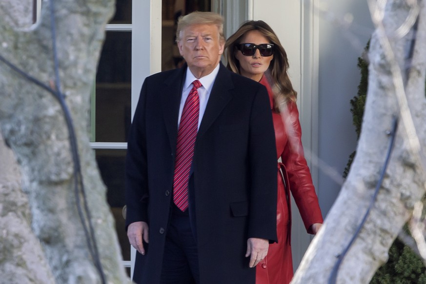 epa08714824 (FILE) - US President Donald J. Trump (L) and First Lady Melania Trump (R) walk from the Oval Office to Marine One on the South Lawn of the White House in Washington, DC, USA, 14 February  ...