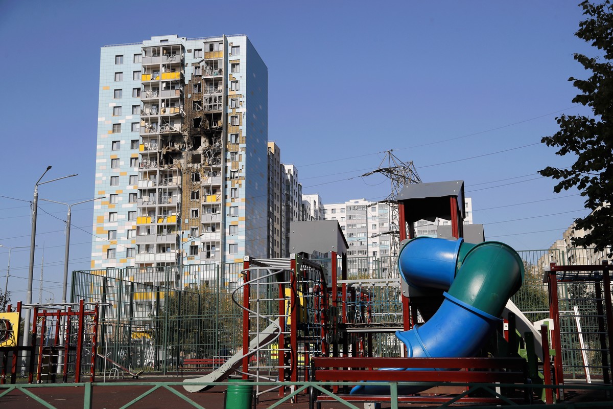 A view of the site of the damaged multi-storey residential building with the children's playground, foreground, following an alleged Ukrainian drone attack in Ramenskoye, outside Moscow, Moscow r ...