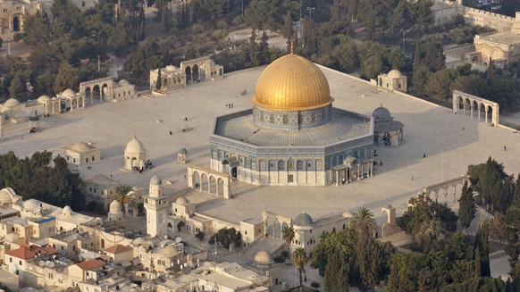 The Dome of the Rock mosque in the Al Aqsa Mosque compound, also known to Jews as the Temple Mount, is seen above the Western Wall, bottom right, in Jerusalem&#039;s Old City in this aerial photo, Tue ...