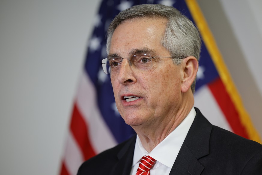 epa11217606 Georgia Secretary of State Brad Raffensperger gives remarks following the Georgia Presidential Primary election in Atlanta, Georgia, USA, 12 March 2024. Both the Republican and Democratic  ...