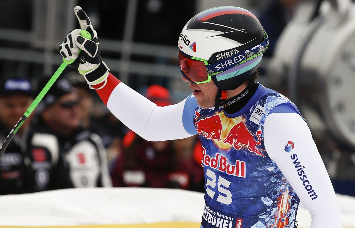 Switzerland's Marc Gisin gets to the finish area after completing an alpine ski, men's World Cup downhill, in Kitzbuehel, Austria, Saturday, Jan. 20, 2018. (AP Photo/Giovani Auletta)