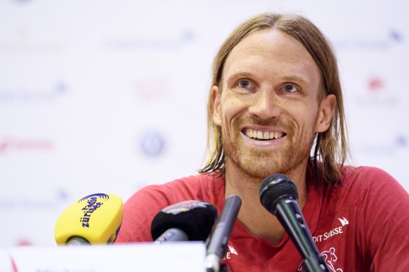 epa06838293 Switzerland player Michael Lang during a press conference after a closed training session of the Switzerland national soccer team at the Torpedo Stadium, in Togliatti, Russia, Monday, June ...