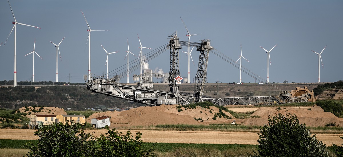 epa10103049 A brown coal excavator removes layers of soil in the Tagebau Garzweiler daylight mine operated by German energy supplier RWE near Luetzerath, Germany, 02 August 2022. The German parliament ...