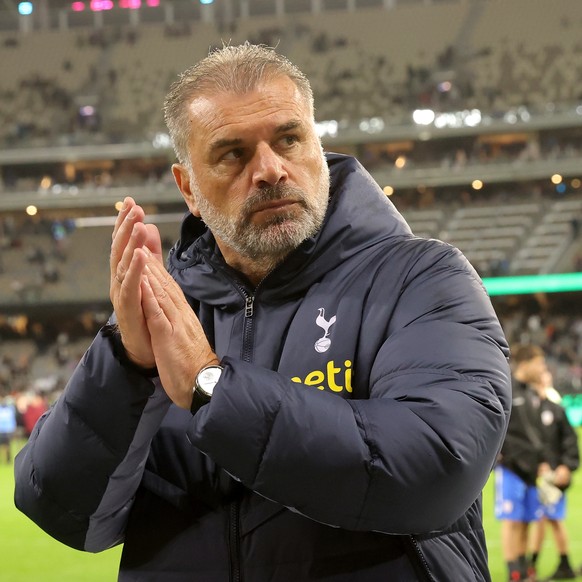 epa10753226 Ange Postecoglou, manager of Tottenham Hotspur applauds the fans after the pre-season soccer match between West Ham United and the Tottenham Hotspurs at Optus Stadium in Perth, Australia,  ...