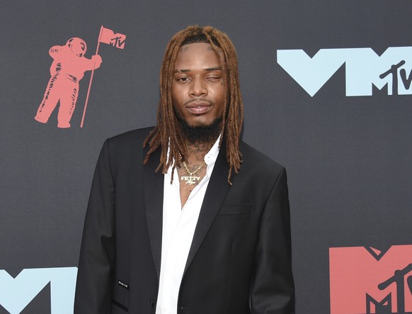 FILE - Fetty Wap appears at the MTV Video Music Awards in Newark, N.J. on Aug. 26, 2019. Fetty Wap, whose real name is Willie Maxwell, has been jailed after prosecutors say he threatened to kill a man ...