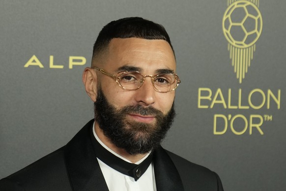 Real Madrid&#039;s Karim Benzema poses for a picture prior the 66th Ballon d&#039;Or ceremony at Theatre du Chatelet in Paris, France, Monday, Oct. 17, 2022. (AP Photo/Francois Mori)
