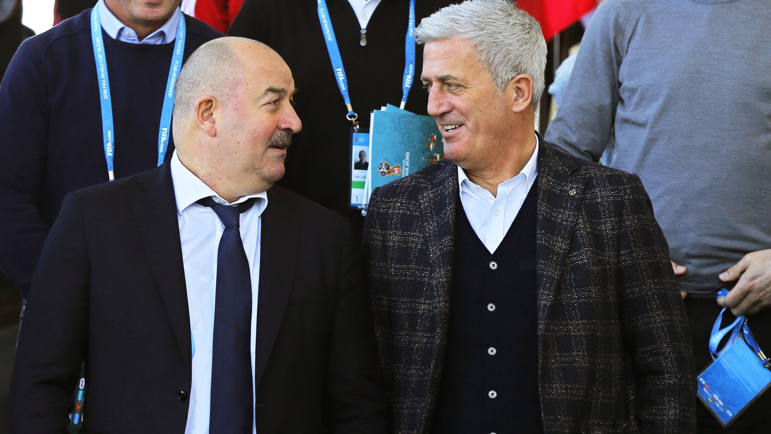 epa06570132 National soccer team head coaches (front row) Stanislav Cherchesov (L) of Russia and Vladimir Petkovic (C) of Switzerland attend a group photo session following the FIFA World Cup 2018 Tea ...