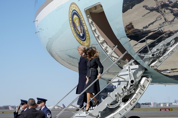 President Donald Trump and first lady Melania Trump arrive at Douglas International Airport in Charlotte, N.C., Friday, March 2, 2018, to attend the funeral of Reverend Billy Graham. (AP Photo/Andrew  ...