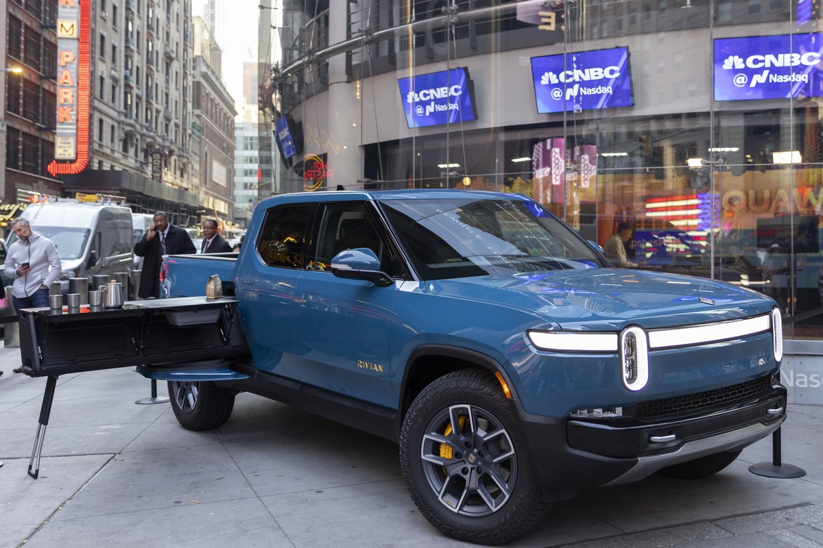 IMAGE DISTRIBUTED FOR RIVIAN AUTOMOTIVE, LLC - Rivian R1T all-electric truck in Times Square on listing day, on Wednesday, Nov. 10, 2021 in New York. Electric vehicle maker Rivian Automotive will anno ...