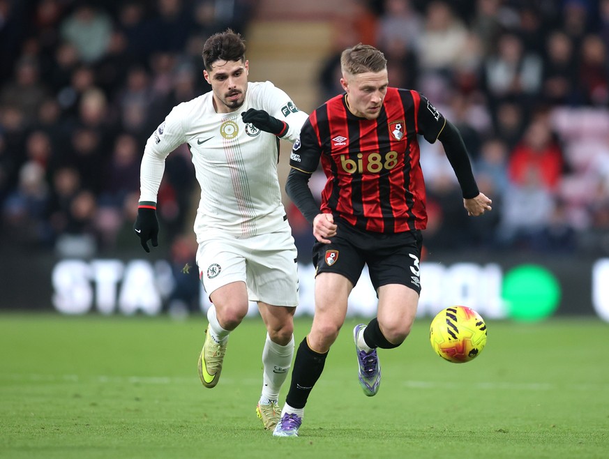 Chelsea&#039;s Pedro Neto, left, and Bournemouth&#039;s Adrien Truffert in action during the English Premier League soccer match between Bournemouth and Chelsea in Bournemouth, England, Saturday Dec.  ...